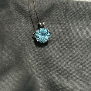 Texas star blue topaz pendant.